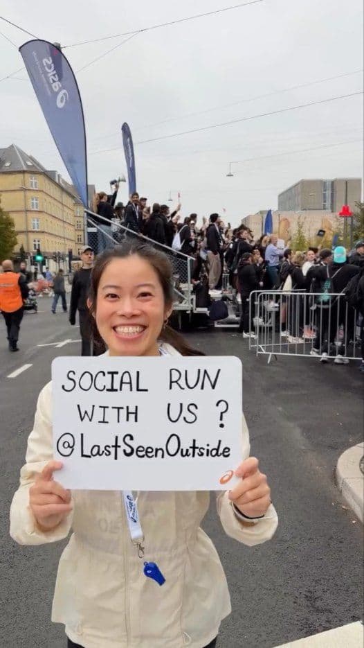 The founder holding a sign: Social run with us? @LastSeenOutside
